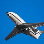 Challenger CL-600 Takes Off, Undercarriage Retracts