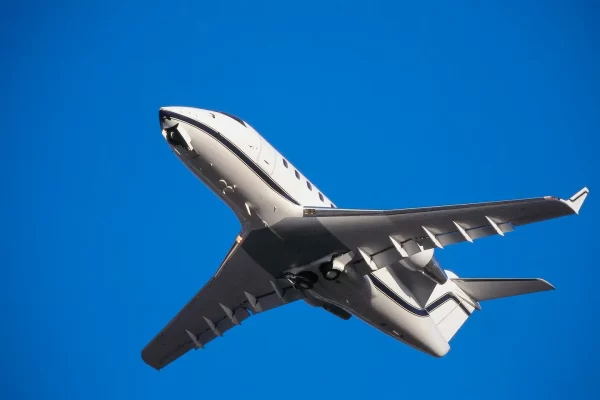 Challenger CL-600 Takes Off, Undercarriage Retracts