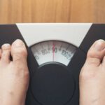 feet on a weight scale