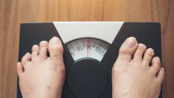 feet on a weight scale