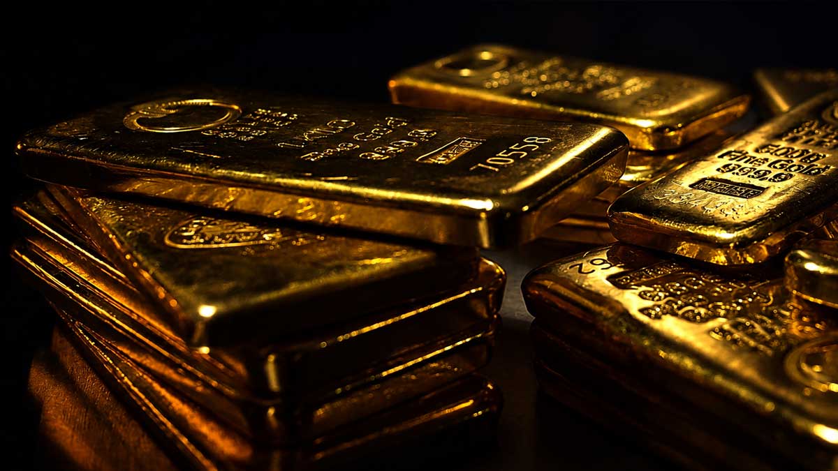 Gold and silver bars with falling prices