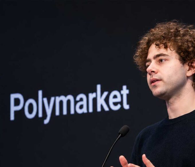Polymarket CEO on stage