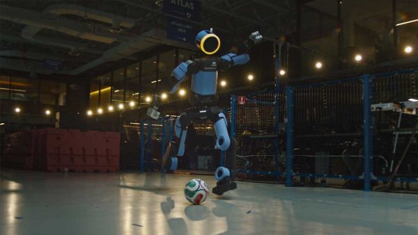 Atlas humanoid robot with soccer ball