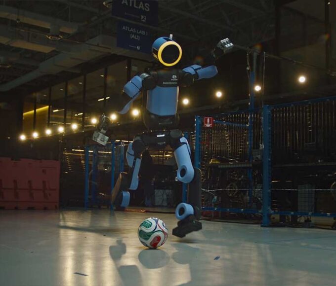Atlas humanoid robot with soccer ball