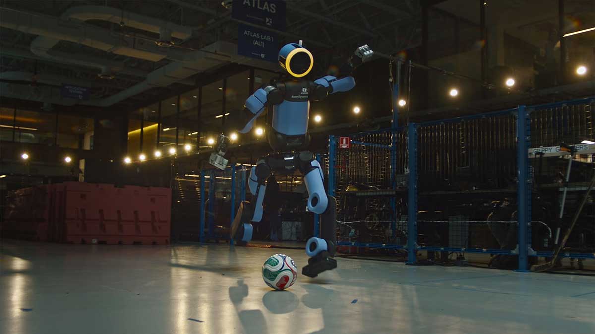 Atlas humanoid robot with soccer ball