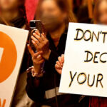 Young people protesting concerns about AI